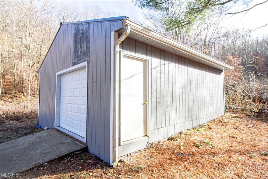 Land for sale in Stark County, Ohio. Just over 13 acres of beautifully wooded property just outside the Waynesburg city limits.  Nice stands of white and red oak valued at over $13,000 for a select cut.  It has a well-built 24' x 24' garage that just received a new steel roof, a fresh coat of paint, and an insulated overhead door.  Surrounding homes enjoy city water, sewer, and natural gas.  Great property for a hunting getaway or new home site. Newly surveyed!  Only 40 minutes from Apple Creek.  Gas and oil rights do not transfer.