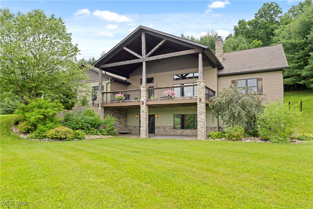 A Country Retreat You Could Only Dream Of!
14+ Acres Nestled in the Most Picturesque Hillside Setting
This stunning custom-built high-end ranch offers sunset views so breathtaking, they rival anything you've seen on the big screen. Every inch of this 5-bedroom, 3.5-bath home is designed for comfort, function, and unforgettable moments.
The owner originally purchased the home with 6.5 acres, then later acquired the three additional buildings on 2.6 more acres, followed by later purchasing an extra 5 acres out back. Today, this incredible retreat spans approximately 14.11 acres across two parcels, offering space, seclusion, and so many possibilities.
Inside, you’ll find soaring ceilings with exposed beam, a chef’s dream kitchen with a spectacular island and beautiful cabinetry, and a gorgeous stone fireplace flanked by built-in bookshelves that add warmth and charm. Spacious custom closets can be found throughout, while radiant heated floors warm the lower level. Even the family dog is treated to a built-in dog wash station in the laundry room! Step outside to your own private oasis—featuring a hot tub (negotiable) on the covered back porch, a massive front porch perfect for rocking chairs and slow mornings, and a walk-out lower patio ideal for entertaining under the stars.
This rare property also includes:
24x32 Party Barn with a fully equipped apartment (full bath, laundry hook-up, heating & air)
32x50 Garage/Workshop with tall doors, concrete floors, pellet stove, electric, and water plumbed in
11x22 Shed with concrete floor for even more storage
Venture into the tall pines out back, where trails wind through your land—perfect for hiking, ATVs, or horseback riding (just needing a bit of trimming to reopen the adventure).
Approximate drive times: 30 minutes to Newark,14 minutes to Dresden,15 minutes to Coshocton, 25 minutes to Zanesville, 1 hour to the airport,6 minutes to Killing Tree Winery