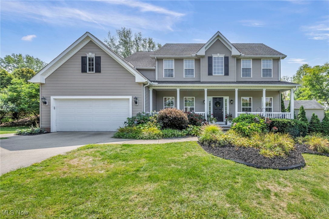 Welcome to this stunning 4-bedroom, 2.5-bath home, perfectly set back from the street with beautifully landscaped grounds. A welcoming front porch invites you in, while the private backyard offers a serene retreat with a spacious deck, lush landscaping, and a cozy fire pit. A storage shed adds extra convenience. Inside, the open floor plan with newer flooring throughout is ideal for both everyday living and entertaining, featuring a gorgeous kitchen with a large island, a massive dining area, and a warm living room with a fireplace. A bright and spacious office provides the perfect work-from-home space, while a versatile additional living room offers flexibility for your lifestyle. First-floor laundry adds ease and functionality. Upstairs, the incredible master suite boasts a walk-in closet and an updated master bathroom, and the additional bedrooms are generously sized. The finished basement expands your living space with endless possibilities, including room for entertaining and even an extra bedroom. With nothing left to do but move right in, this home truly has it all.