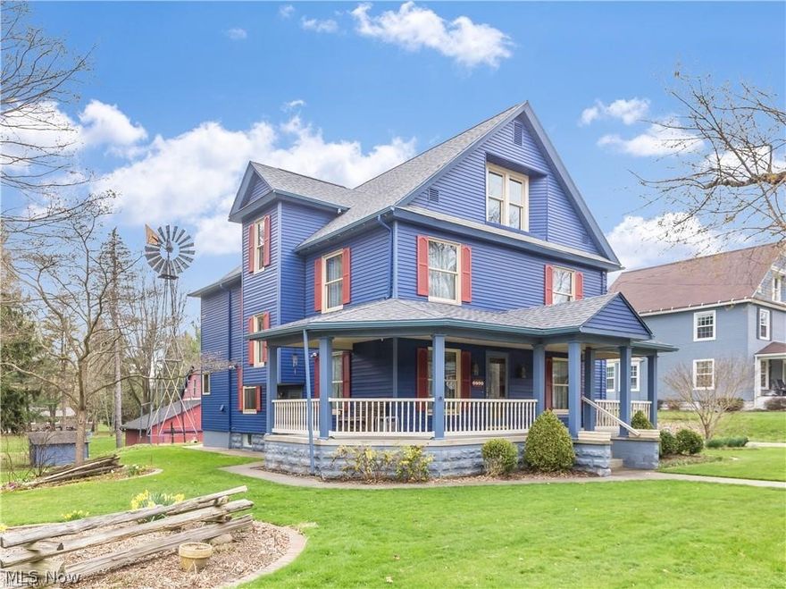 Meticulously maintained 3 bedroom, 2.1 bath Century home. Lots of curb appeal and charm with the large wrap around porch and plenty of beautiful original woodwork throughout the home. Spacious and open kitchen with a center island and dinette plus built-in desk area. You will also enjoy the wood plank ceiling, custom Oak flooring, granite countertops, circular island that includes most appliances and a 1st floor laundry. Parlor has a gorgeous staircase and formal dining room with window seat. 2nd floor has 9' ceilings. Master bedroom has an attached solarium w/cedar walls & ceiling, slate floor & dry sink. The private bath features redwood accents and a bathtub. There are 2 more spacious bedrooms w/adjoining closets plus an office or sitting room. Added bonus is a walk-up attic that provides additional storage space. There are several outbuildings including a smokehouse, 4 car garage/barn with loft, and shed. Updates include: furnaces 2001, hot water tank 2012, refrigerator and water s