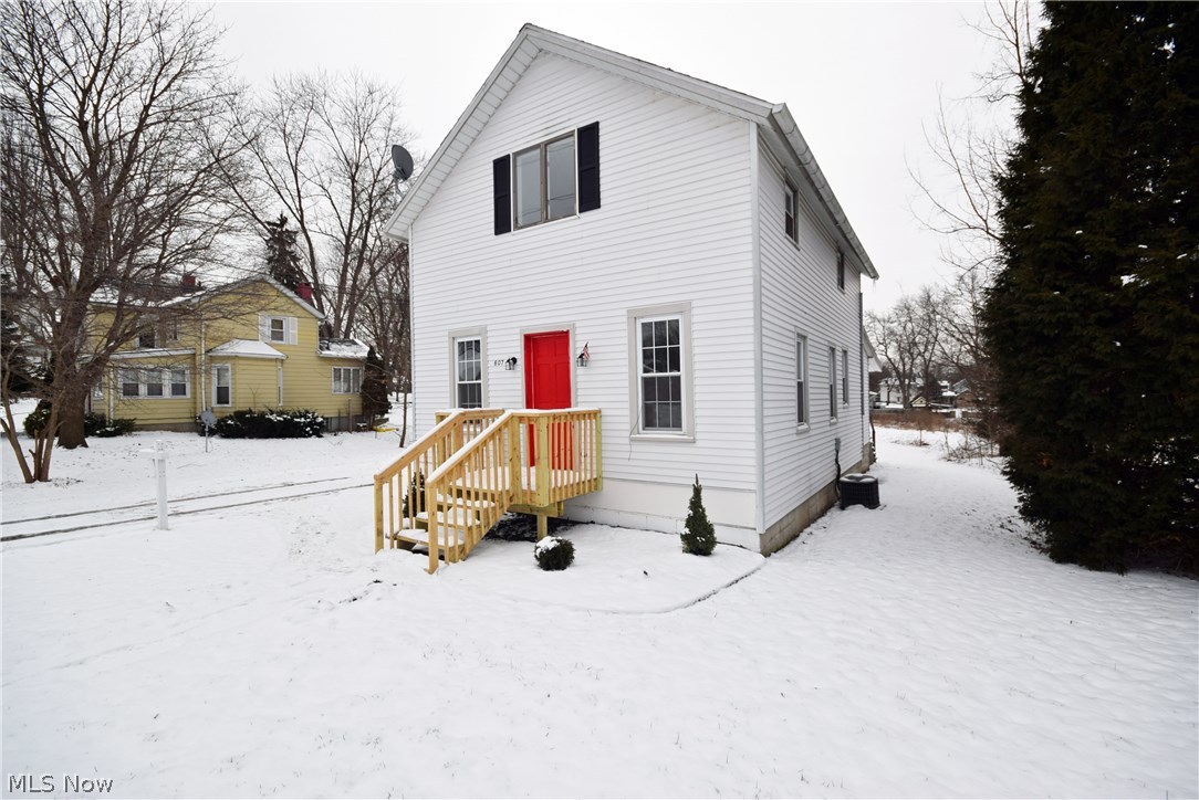 Stop and take a look at this completely remodeled 3 bedroom home in Ravenna! Completely brand new kitchen! New flooring and everything freshly painted throughout. New bathroom with full shower. 1 car detached garage with a new garage door which will be installed in a few days. Great opportunity to own an attractive, updated and still very affordable home! Call today to schedule your showing! Don't miss out!