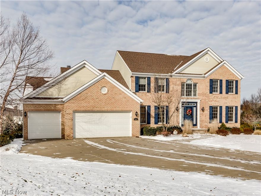 This home has exquisite curb appeal. There is substantial room in this 4-5 bedroom, 3 1/2 bath over 4,000 square foot two story. The walk-out lower level adds over 1,000 square feet and includes a recreation area, sun room, kitchen area,bedroom/exercise room,full bath and a game area. The spacious lower level gives the flexibility for entertaining or could be an extra living suite.Picturesque back yard offers lower patio and upper deck and a view that can't be beat.First floor has a desirable open floor plan that includes a sun room. The kitchen is enhanced with rich,cherry cabinetry and ample counter space.There is an inviting master suite with pampering master bath which includes a jacuzzi tub! To top things off  enjoy the convenience of a three car garage, zoned heat, first floor laundry and a security system. This home is move in ready and has a very pleasant cool color paint pallet that is refreshing and timeless.