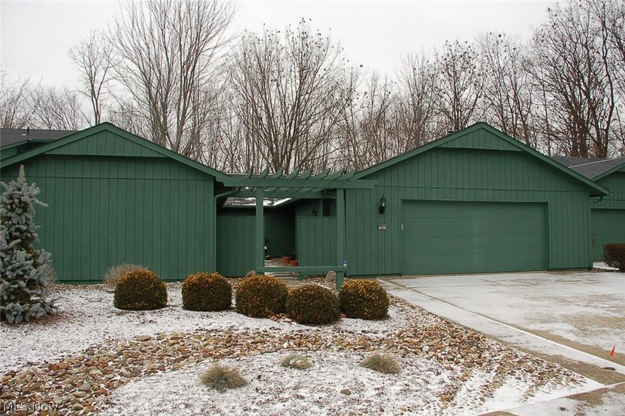 Enjoy the beautiful views of nature form this spacious detached cluster. Enter into the enormous great room with fireplace and built ins. The spacious kitchen offers plenty of cabinetry, and opens to the large sun room, the perfect place to relax. Two bedrooms with walk in closets, the master suite features a hip full bath, skylight, jetted tub and dual sinks. Don't miss the extra room in the over sized garage that is ideal for hobbies. The location and view are the star of the show here. The home does need some updating but the size and location make it a must see for the buyer that wants low maintenance but not a small home.