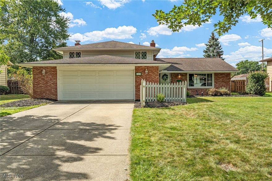 Welcome home to this beautifully maintained split-level colonial packed with updates and thoughtful design throughout! The fully remodeled kitchen steals the show with gorgeous cabinetry, granite countertops, tile backsplash, under-cabinet lighting, a built-in wine bar, breakfast bar, pantry cabinet with pull-out drawers, spice pull-out, and stainless steel appliances. Tile flooring carries seamlessly into the dining area, and vinyl windows enhance the bright, welcoming space.

Fresh paint flows throughout most of the home. The sunken family room offers vinyl flooring a cozy wood-burning fireplace, and direct access to the spacious tiled four-season room, perfect for entertaining year-round. An updated half bath with new LVP flooring is conveniently located on the lower level.

Upstairs, you’ll find three generous bedrooms with refinished hardwood floors, ceiling fans, and great closet space. The updated full bath features a tile shower, double-sink vanity, and modern flooring. The large primary bedroom includes double closets and direct access to the bathroom.

The lower-level laundry and utility room provide ample storage, a new double sink, and entry to the attached two-car garage with nature stone flooring. A newly updated den or flex space adds even more versatility for work, play, or hobbies.

Step outside to a private, fully fenced backyard with dual gates, a storage shed, and a gas grill ready for summer gatherings. Furnace and A/C (2008), Roof (2007), and Hot Water Tank (2021).