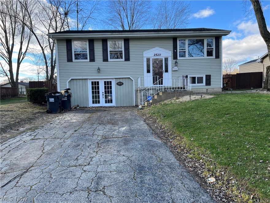 Huge bi-level home in a beautiful area! Loads of cabinets in the kitchen! Upstairs Living Room  is open to the Dining Room with sliders and deck to the private back yard. Three bedrooms upstairs. Two large rooms in the lower level plus laundry and a half bath. One of the rooms can be used as a large fourth bedroom! The two car garage has been remodeled into a large Recreation room. The yard is completely fenced and ready for a new pool! Great house for extra room.