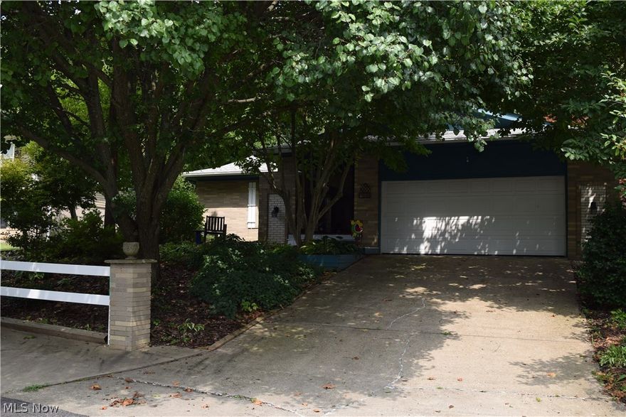 Enjoy the outdoors with this landscaped, treed home!  Lovely screened porch overlooking a private in-ground pool.  Beautifully updated 3 bedroom, 2.5 bath ranch home with finished lower level.  Neutral colors, open floor plan, two car garage.  Home warranty.
