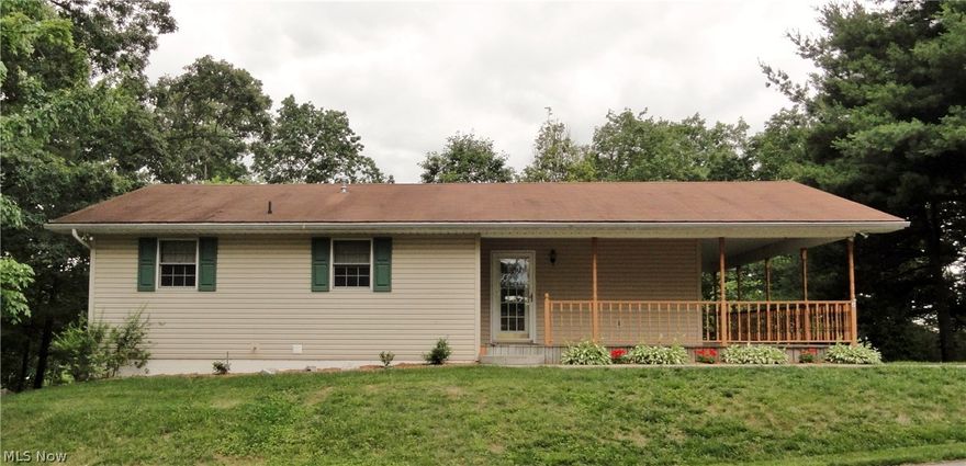 One owner wonderful home that is pristine, all freshly painted and all carpets professionally cleaned.  Just waiting for a new owner.  In the city limits of North Parkersburg, BUT THIS HOME QUALIFIES FOR "USDA FINANCING"-located on a nice paved dead end road so there is minimal traffic. Open main floor plan & French doors in living area give access to large wrap covered porch, great for relaxing and enjoying nature. The master has a full bath and there is an additional full main bath. There are large closets in "every" bedroom.  Interior doors are Poplar, all wood trim and special order JELD-WEN windows throughout the main level. Electric is 200 amp service. There is a full HEATED walk out basement for an additional--1194 sq ft-- of space.  Basement offers high ceilings making it easy to finish for more living space and also a rough in for 3rd bath.  Orange markers still in place from recent survey. There is a nice side yard with storage building, and covered parking for 2 vehicles. Ac