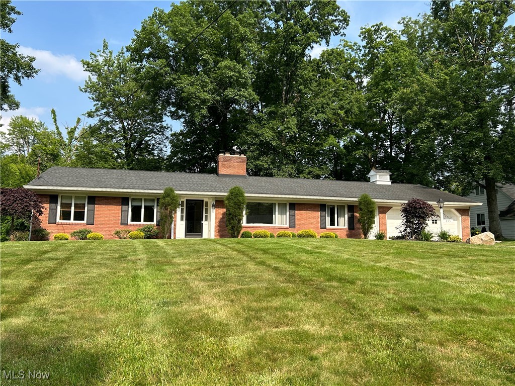 CLEAN, WELL MAINTAINED, READY TO OCCUPY, ALL BRICK RANCH home featuring 3 bedrooms and 2 full baths on main floor with lots of closets, a formal living room with fireplace and formal dining room. Inquire further about the potential for a 1st floor laundry room. An updated kitchen with soft-close cabinetry, new counter tops, subway tile backsplash and Bosch stainless steel appliances that flows into a cozy rec-room with hardwood floors, wood burning fireplace and a sliding door that enters onto a large concrete patio. The patio is partially covered and overlooks a beautiful, secluded back yard with trees, a creek at the back edge. The home is located close to the bike trail and swim club. Other highlights include an oversized double car attached garage, recently installed dimensional shingle roof, oversized gutters with leaf guard protection and new soffits. The basement is partially finished and includes a large multi-purpose room with closet (potential 4th bedroom) and a full bathroom. The basement has also been professionally waterproofed and has glass block windows. This home is very clean, well taken care of and ready to move into.