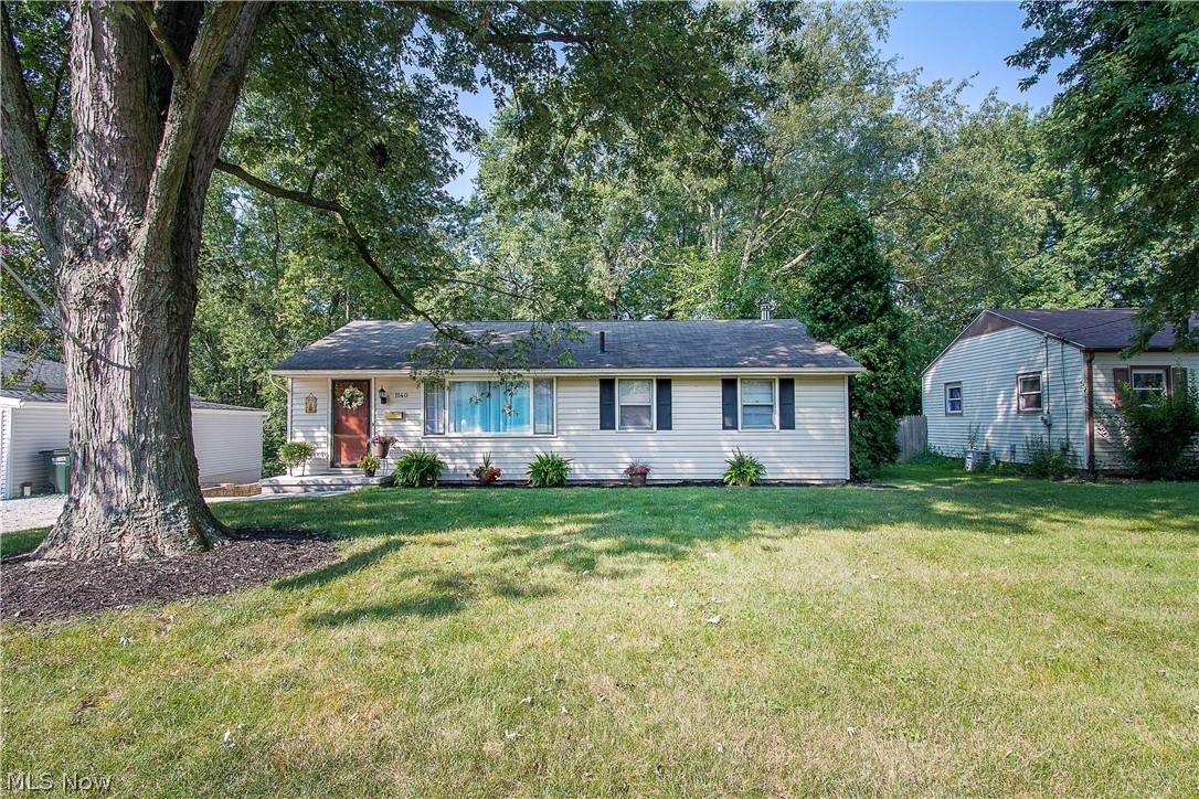 Welcome to 1140 Valley DR NW, North Canton. This lovely ranch home is located near Price Park & convenient to shopping, restaurants, excellent schools, etc. This home offers 3 bedrooms (with hardwood floors), a full bathroom (with double sinks), recently installed laminate flooring (2019) in the living room, and the eat-in kitchen. Also, there is a spacious recreation room on the lower level with a dry bar, a wood-burning fireplace, built-in shelves, and sliders to a charming private patio with rock landscaping/mulch and a nice backyard. Some updates include new Gutters (2020), water heater (2021), vinyl sliding glass door (patio), new concrete front porch (2021), fresh paint in the master bedroom, bathroom, and exterior wall (2021), new LED bathroom light & fan, dual bathroom sinks, new bedroom LED light fixture (2021), new gravel stone (2021). Great starter home or downsizing. Make an appointment for your private showing today!
