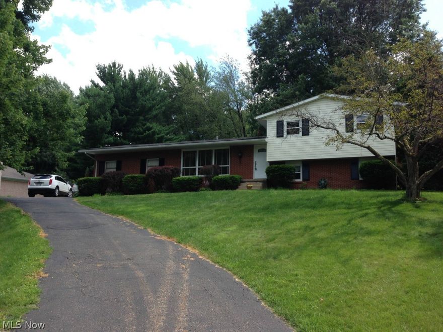 Beautiful split in Jackson Township.  Many new upgrades.  2014 - Kitchen totally remodeled, interior/exterior paint, front door, garage man door, interior doors, door from garage to house, upstairs toilet, carpet in family room and many new light fixtures.  2013 -basement wall/dry system, sump pump, well pump and dishwasher.  Newer furnace and windows.  Title work will be completed at Bond Title.