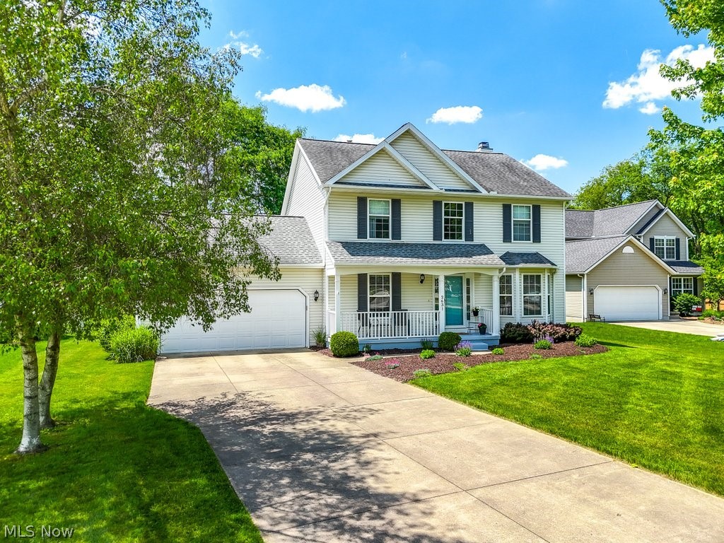 Welcome to your new home tucked back on the end of a cul-de-sac in the Stonecreek development in Copley-Fairlawn Schools! Your new home features 3 bedrooms, 2.5-baths, finished lower level and serene private views from your deck! The two-story foyer opens to hardwood floors (2016) in the dining, living, and family (with fireplace!) rooms. The spacious kitchen stainless steel appliances and access to your new back yard. Enjoy all seasons from the deck overlooking the manicured yard and convenient storage shed. Upstairs includes a master bedroom with vaulted ceilings, two walk-in closets, and an en-suite bath! Additionally, two bedrooms and a full bath (Updated 2020). Ultra convenient upper level hallway laundry room includes washer and dryer! The finished lower level offers extra entertaining space along with seperate storage space. Additional updates include roof (2012), hot water tank (2015), A/C (2015) and new blinds (2017). This clean, well-cared-for home is move-in ready. Minutes from the freeway, shopping, dining and entertainment options! This home is exactly what you have been searching for!
