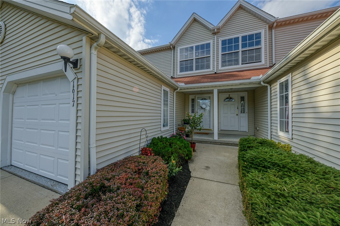 Picture perfect condo in the desirable Maplewood Development! Convenient Streetsboro location keeps you close to all the amenities & highways while being nestled back in a gorgeous wooded area. You will love walks through the neighborhood, enjoying the views and charming ponds. Walk in the front foyer & take in all of the stunning updates! Kitchen offers brand new black stainless top of the line appliances, including range, microwave, dishwasher, & fridge. Lots of counter space & cabinetry w/ a glass backsplash as a finishing touch. The open floor plan flows into the dining & living room area. Sleek laminate flooring runs all through the lower level. Sliders to the patio provide wonderful natural lighting & a serene view. There's a spacious half bath w/ beautiful updates on the main floor as well as garage access. Down to the lower level for an incredible bonus living space! Perfect as a family room, media room, workout space or guest space. There is even a full 3 piece bathroom on th