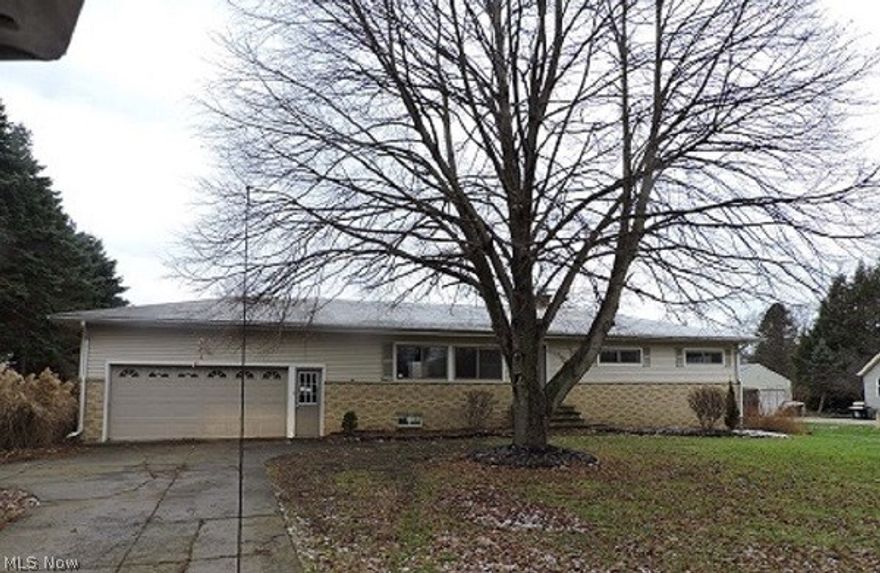 A little bit country, but a lot of Home! This attractive Madison Township ranch features 4 restful bedrooms featuring hardwood floors, great closet space and the Master Bedroom offers a master bath! Relax in the warm living room with hardwood floors and large picture window. The kitchen is spacious and features ceramic tile and a dining area too!. The full unfinished basement is great for storage or make it into a family or rec room. The attached 2 car garage with half bath and additional shed offer great storage space. All this and more setting on 6.48 acres.