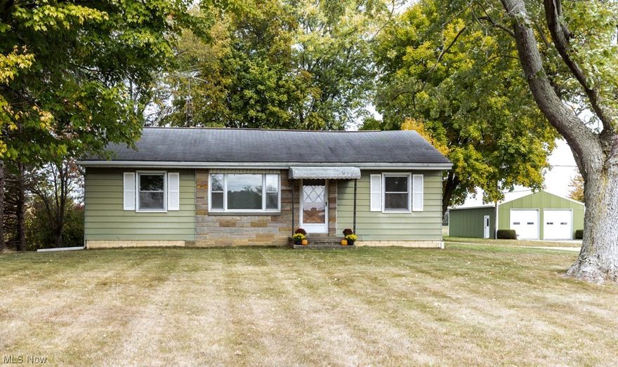 Nestled into the beautiful, rolling hills of Wayne county, you'll find this 2 bed/1 bath ranch home on nearly an acre of land - just right for a starter home or a great place to downsize! Inside, you'll see the home has all the original woodwork and cabinetry throughout, with a first floor laundry and a 2-car attached garage. There is a full, unfinished basement which doubles the square footage, if finished. Also included is another large outbuilding (28’ x 36’) built in 1987 with a taller entrance for a camper or bigger truck. The current owner used it as his shop. It has 240 volt electrical outlets for an air compressor or welder; water source; a large antique sink; drain and a heater. Nothing but cornstalks to the left and behind the house, so expect the peace and quiet you deserve. Live in it while you fix it up or use it as an investment property! A one year Home Warranty is provided for your peace of mind and you can't do better than Dalton schools, right? Schedule your showing today and get in before the holidays!!