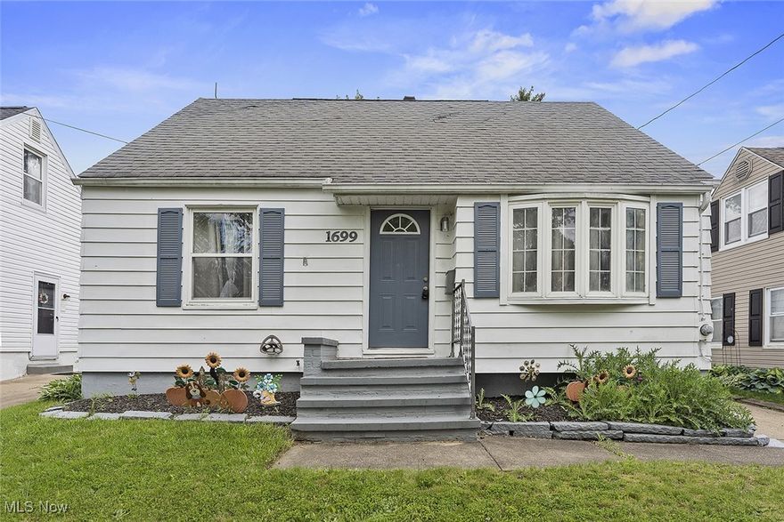 Welcome to 1699 Redwood Ave – A Cozy and Updated Cape Cod in Akron! This charming 3-bedroom, 2-bath home offers just over 2,000 sq ft of well-maintained living space, blending comfort and style throughout. Step inside to a warm and inviting living room featuring hardwood floors, a fresh white palette accented with natural wood details, and plenty of natural light. The updated kitchen boasts a breakfast bar, sleek appliances—including refrigerator, stove, microwave, and dishwasher—and flows seamlessly into the open dining area and spacious family room. Enjoy easy access to the backyard via sliding glass doors that lead to a cozy deck, perfect for relaxing or entertaining. The main floor includes two bedrooms and a full bath, while the upstairs offers a large bonus bedroom with generous closet space. The partially finished basement provides even more versatility, with a recreation room, second full bath, laundry area, and additional storage space. Outside, you'll find a small rear deck, detached garage, and a sizable yard—ideal for outdoor enjoyment. Recent updates include fresh interior paint, new screen door, updated laundry room flooring, and stylish tile in the basement. This move-in ready home offers classic charm with thoughtful modern touches. Don’t miss this one!