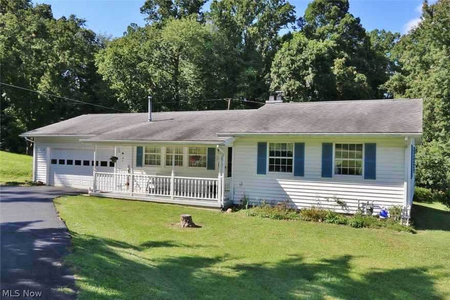 Great North End Location. Ranch home offering 3 bedrooms with original hardwood floors, spacious eat in kitchen, living room, full bath on main floor, finished basement with family room, bar, laundry /utility room , full bath and  workshop area. 2 car attached garage, covered front porch and covered back patio. This property will not last. Schedule your showing today. Property is priced to sell.