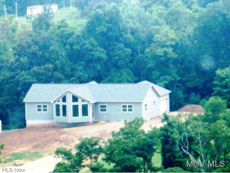 Beautiful chalet style home-16' cathedral ceiling in great room flowing to kitchen-free standing, see through, fireplace separating great room and kitchen-hardwood floors through out the house - ceramic tile in baths & laundry-large master suite 6x14 walk in closet-extra large shower-huge family room in lower level w/bar area and 1/2 bath-walkout to beautiful lot w/patio area-oversized 2 car garage-beautiful setting.  #5138  Elem: Little Warren Elementary  Elem/Bus: Y  JrHigh: Warren Middle  JrHigh/Bus: Y  High: Warren High School  High/Bus: Y  Fire: VOL  Police: SHF  PossFreeGas: N  ;SQFT=Fin L1:2375, Fin Bsmt:650, Fin Above:2375, Fin Total:3025, Unfin Above:0;GAR= 2 Car Att