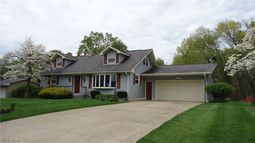 Don't miss this adorable Cape Cod style bungalow with 4 bedrooms & 2 full baths. The kitchen was remodeled in 2010 and includes gorgeous cabinetry, Corian countertops and stainless steel appliances. The second floor has been newly painted and furnished with new carpeting. The 2 large rooms in the lower level have also been freshened with comfy carpet. The covered concrete patio off the kitchen will be sure to please with a nice sized yard and view of lots of trees. This home has been beautifully maintained.