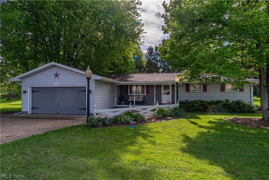 Single floor living in this great Massillon Ranch home.  Situated on a flat half-acre lot, this home is ready for your personal touches.  Walkthrough the front door into the spacious living room with refinished hardwood flooring that runs throughout the home.  You will love the open concept design in the main living areas. The kitchen is open into a large dining room with doors to the back deck overlooking the private backyard.  The great room offers even more living space with an exposed beam ceiling and wood burner.  Off this room is the over-sized 2 car garage.  This home has 3 bedrooms on the main level.  The master bedroom (wood under carpet) has an en-suite half bath.  There is a full bathroom off the hallway. Main floor laundry is tucked away in a closet in the dining/kitchen area.  This could be converted to a pantry and laundry could be returned to the lower level if you wish.  The spacious lower level offers plenty of space for storage and has a bonus shower.  Other updates i