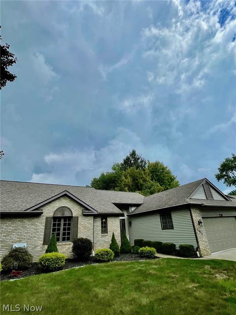 Photo of 4911 NW Pond Drive NW, North Canton, OH 44720 (MLS # 5239248)
