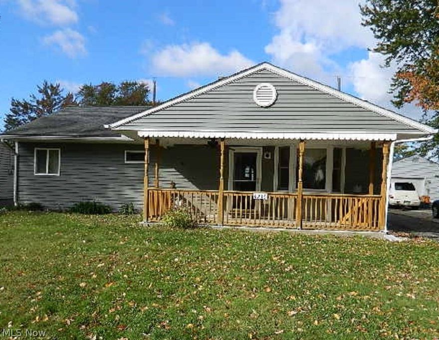 Come home to this charming ranch in Lorain. Front porch entry. Wood floors throughout! Bay window in living room. Light & bright kitchen with tons of cabinets, tiled counters and dining area with second entry from back. Spacious bedrooms and full, tiled bath. Oversized detached 2-car garage with work space. Fenced-in backyard. Great location! Close to shopping, schools and park!