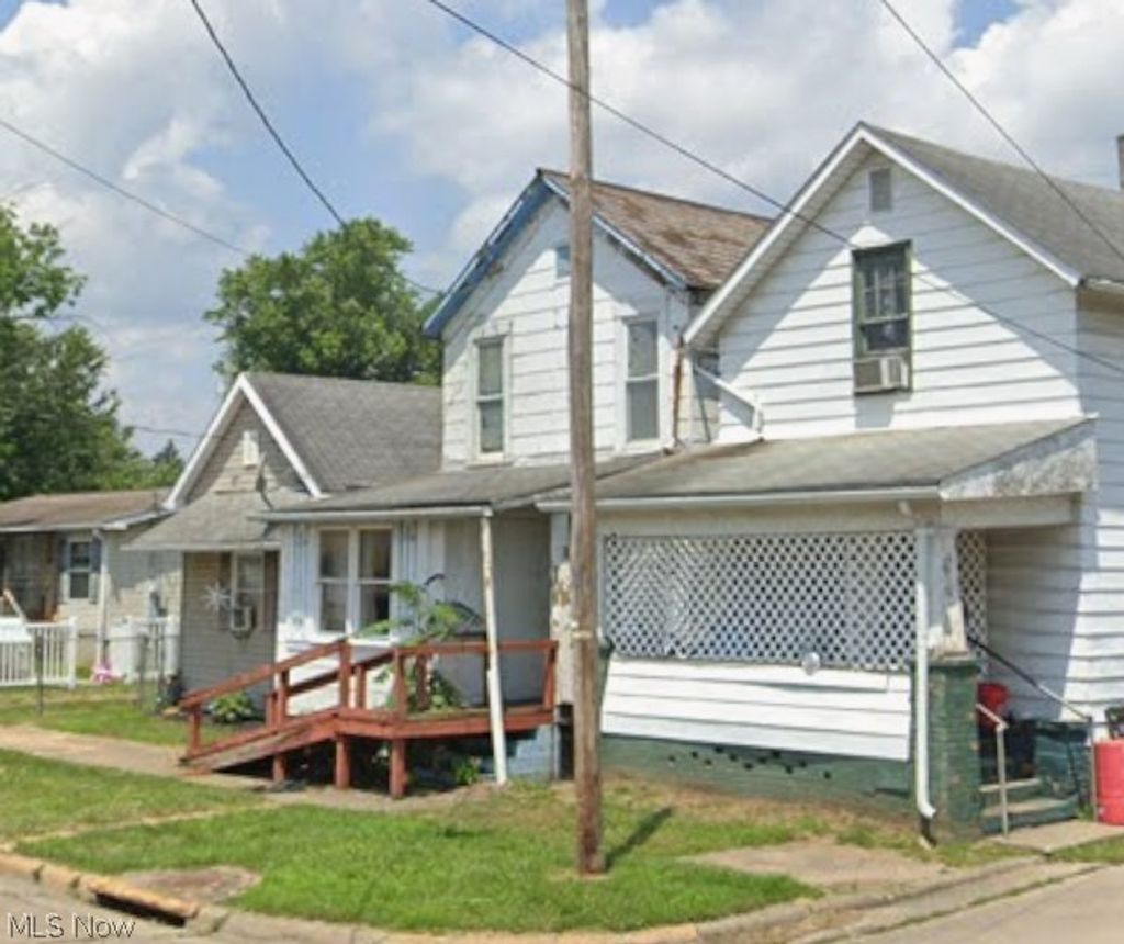 Photo of 215 E 5th Street, Uhrichsville, OH 44683 (MLS # 5200953)