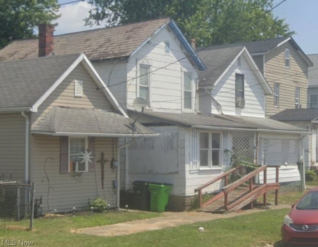 Photo of 215 E 5th Street, Uhrichsville, OH 44683 (MLS # 5200953)