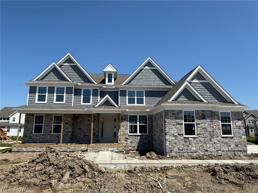 Brand new construction home ready for you to move-in this Spring in the Legacy Isle Golf Course Community! The Skyview plan welcomes with a wide-open grand feel with tons of natural light. The Final new build home on the quiet cul-de-sac street, of Trillium Court in Legacy Isle. Enjoy cooking and entertaining in your gourmet kitchen featuring adjustable soft close cabinets with roll outs, hidden trash, double ovens, and Quartz countertops. The home has beautiful luxury plank flooring and 9ft. ceilings through-out the first floor. The first floor features a grand laundry and pantry area, split office/living space that can be used for many purposes, along with a planning space and XL formal dining room. Upstairs the first stop is the grand owner’s suite featuring a retreat area, walk in closet, and massive bathroom with custom features. Down the hall is a loft/game room space. Each second bedroom has a walk-in closet and an attached bathroom. Off the back of the home is a 23ft long raised covered porch with limited maintenance decking. The basement has extra tall 9ft ceilings and is bedroom capable with a full-size egress window. You will love your brand-new home and the convenience of walking distance to the pool, golf course, clubhouse, driving range, and restaurant!