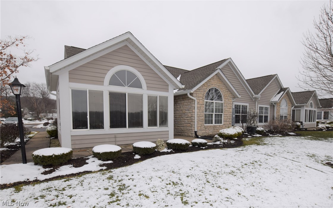 Welcome to 368 Millennium Drive; an immaculately maintained 3-bedroom, 2-bathroom condo in Tallmadge. This home has an open floor plan and Cathedral ceilings. The kitchen has new, bright white cabinets and appliances, beautiful counter tops, a breakfast bar, and a ton of storage space. An open dining area is located between the kitchen and living room. The living room has gorgeous flooring and a corner fireplace that you can cozy up next to during the winter. Off the living room, there are doors leading to a wonderful sun-room with outdoor access. The master bedroom has Cathedral ceilings, a large master bathroom, and a walk-in closet. The two other bedrooms and full bathroom are spacious. Laundry room is located off the kitchen. Don’t let this lovely condo pass you by!