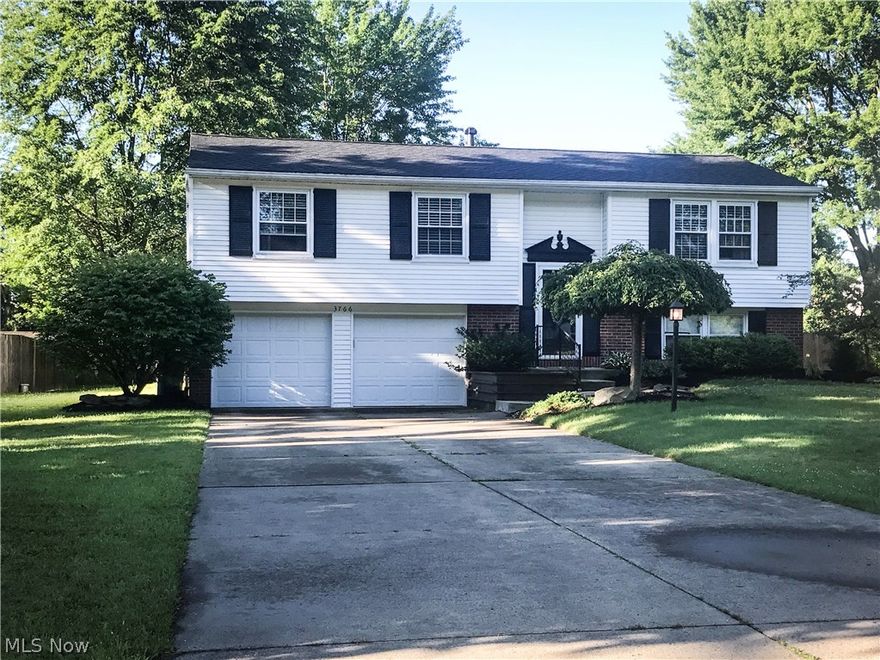 This stunning move in ready home features so many updates and upgrades! Located on a dead end street in Howland Schools! 2 car attach garage with tons of extra storage space! The oversized open kitchen features all stainless steel appliances, ceramic flooring, crown molding & recessed can lighting all on dimers! The master suites features a walk-in custom tiled shower with full glass doors. All rooms are spacious with big closets! 
The stone gas fire place is accented with a beautiful wood mantel making this family room very comfy with tons of extra space! The walkout basement flows out to a beautiful outside space, the concrete patio leads to stairs leading up to the oversized deck with sliders leading back into your amazing kitchen area!
1 Year HMS WARRANTY included!