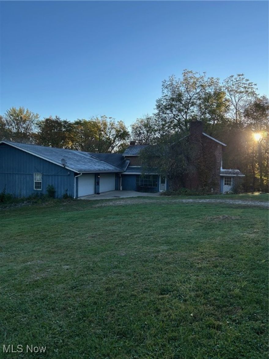 Amazing 4-5 bedroom 3 & 1/2 bath home, with 4500+ sq. ft. living area, in Franklin Local Schools* Large entry room includes a wood burning stove*A large ranch was built onto the existing home, in 1998, that is handicap accessible, including wide doorways & hallways*Wait til you step into the beautiful, newly remodeled kitchen with updated cabinets, counter, flooring & appliances*It boasts a huge master suite that includes laundry hookups & a magnificent walk-in Redwood Cedar shower, that’s all handicap accessible*Includes half baths on each side of the shower room & all have excellent lighting & Skylights for added natural lighting as well*Includes 2 very nice sized bedrooms with dual closets & Formal Dining room with atrium doors leading to wrap around deck*All wood floors, new carpet & new updated paint throughout*Did I mention the multiple garages? Room enough for ‘she shed’ ‘man cave’ And ‘children’s gaming room’ Amazing space for any imagination*Nice size out building to house anything for your yard & gardening love, on 3.69 acres m/l*Includes hoards of storage* THIS IS HOME