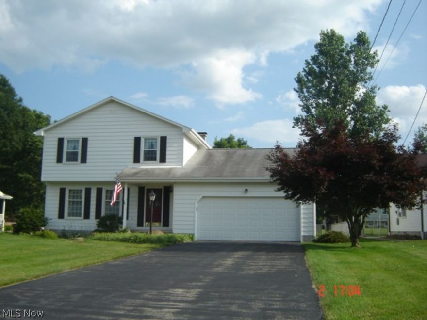Generous room sizes make this home a must for the young growing family or if you just want room to roam or be the one to host the holiday parties where family and friends gather. Ample closet and storage space on first and second floor. Foyer, Living room, formal dining room, eat in kitchen with appliances, first floor family room with an attached first floor sunroom that leads to a large and flat backyard for summer picnics. Home has replacement windows, some new paint and all new carpeting installed 1/14 plus an attached 2.5 car garage. Located in a desirable Hubbard neighborhood, low traffic area where you can ride your bike, jog, or walk your dog just for your relaxation. Located near the park, schools, and center of town. Close to shopping, restaurants, churches, and banking. Minutes from State Route 80 for an easy commute to Cleveland or PA. Come see your new home!