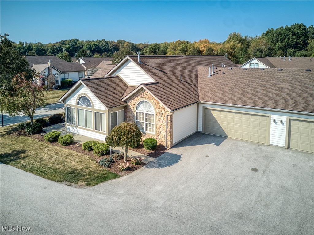 LOOKING FOR AN EASIER PATH OF HOMEOWNERSHIP, DOWNSIZING, ONE FLOOR LIVING, LOW MAINTENANCE,
RELAXING BY THE POOL? Condo living is for you!! Welcome to THE CROSSINGSin TALLMADGE.
This 2 bedroom, 2 bath, ranch style condo should be your next move! This well-maintained unit has a very open floor
plan. An abundance of light filters into each of the rooms. The fully-applianced kitchen has room for a small table plus
the dining area is adjacent to the living room and the kitchen areas. The sunny and bright sun room has French doors
creating space to read and relax. Plus it adds great extra space for entertaining. There is newer carpet throughout, the
vaulted ceilings add a feeling of spaciousness.
The primary ensuite with walk in closet and walk in shower offer plenty of privacy. The second bedroom is a perfect
setup.. There's access to the 2nd full bath from the bedroom or the hallway. The living room has a lovely corner
fireplace with gas logs.
Easy maintenance begins outside with landscaping, grass mowing, and snow removal. The roof was replaced in 2025.
Then you can head to the pool and adjacent clubhouse for more relaxation. The clubhouse is available for private
parties plus there is fitness equipment available for your daily workouts! ! Come see for your self!