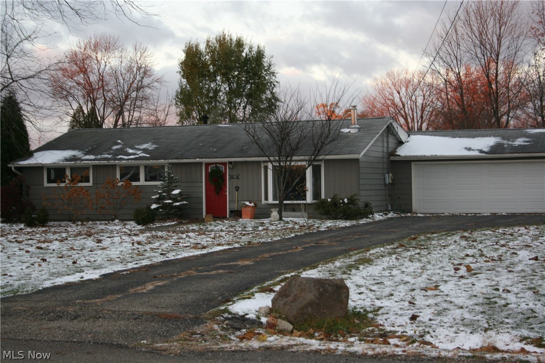 Pretty Ranch with nice yard and landscaping. This 3 Bedroom and 1 Full Bath Home has so much to offer! Nice sized Living Room with wood burning stove welcomes you to this cozy house! Nice sized Kitchen with gorgeous Custom Poplar Cabinets and movable island. So many cabinets you must come to see them! Large Dining Room for entertaining and a wonderful, big, bright Family Room addition with Vaulted ceiling and skylights and access to the deck and fenced in backyard. There is a Gazebo attached to the deck and both a vegetable garden and perennial beds. 3 Bedrooms with built-in bookshelves, lots of closets with organizers and an updated Full Bath with extra built-in cabinets, beautiful linen cabinets, complete this lovely home. Newer wood look laminate floors throughout. 2 car attached garage with workbenches along 1 wall and a storage shed in the backyard as well. Great location in a lovely neighborhood!