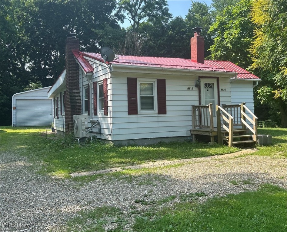Looking for a serene getaway close to Lake Erie, Ashtabula county wineries and the Geneva on the lake strip? look no further.
With new septic in 2016 ( last serviced in 2024) Metal roof installation in 2018, and mini split heating/cooling in 2019, \ this charming cottage is just waiting for the finishing touches. The home has an enclosed porch leading to the large living/dining area. The Galley kitchen with bar and pantry area adjoins a bonus room that could be converted to a second bedroom. The existing bedroom has generous closet space. There is a full basement with laundry area and loads of storage. A large metal garage with has plenty of room for two cars plus ample storage. The backyard deck overlooks a wooded ravine, perfect for relaxing. Additional improvements are listed in attached supplements. Come take a look and see the potential!