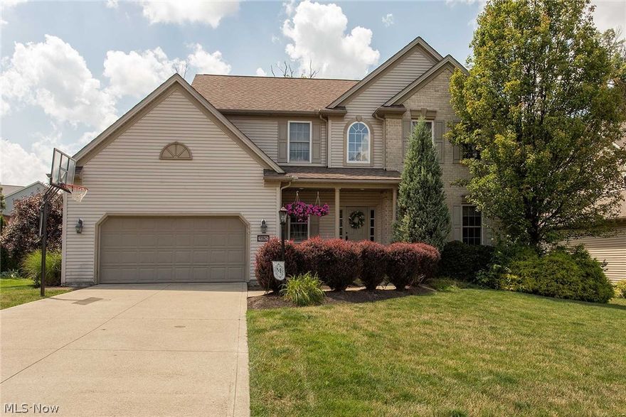 Walk in and be impressed. Remodeled to all the latest amenities you'd get in a newly constructed home. Granite kitchen countertops with an island, stainless steel appliances, ceramic flooring, pantry and wine cooler. Great Room off the kitchen that has walkout to your private deck with covered trellis and wooded view - no homes behind! Great two-story foyer with lots of light. Formal dining room, office/den with tray ceiling and French doors.  First floor laundry.  Master bedroom with vaulted ceilings, double sinks and garden tub. Full, finished basement includes recreation room with wet bar, 1/2 bath and media room with projection TV.  Don't wait to build-- this home is a "must see". One Year Buyer Home Warranty.  Montville Twp.--no city income tax.  Quick occupancy possible.