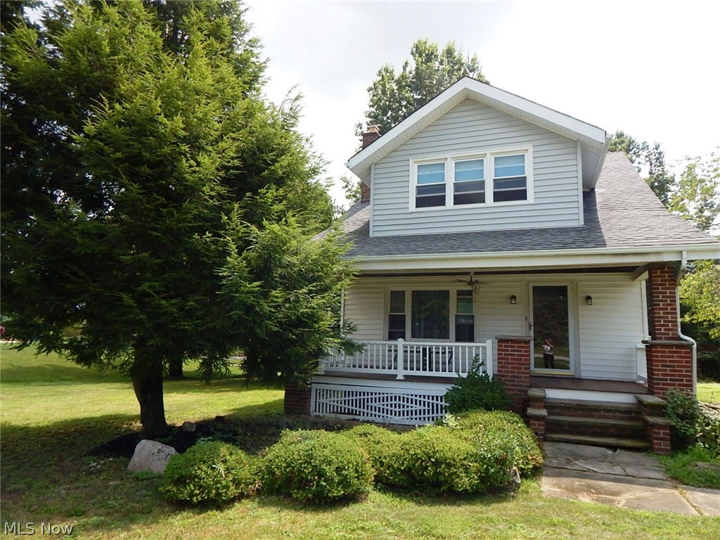 Great starter home! This home sits on 1.22 acres and has a 56 x 25 barn with a two-car garage opening. As you enter the home's living room, your eyes are drawn to the wood-burning fireplace and charming mantel with built-ins. The living room and dining room have hardwood floors. The first floor also includes a sunroom with ceramic floor next to the dining room, and a half bath. The upstairs is all hardwood floors and has three bedrooms and a full bath. All appliances will remain with the home. The roof is 10-12 years old and the windows were replaced in 2002.