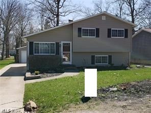 Three level split. Great floor plan. Updated baths, kitchen, paint and flooring. Fireplace in family room. One car detached garage. Nicely landscaped yard.