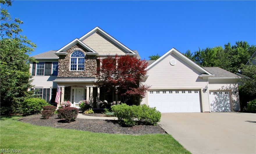 Beautifully maintained 3 - 4 bedroom Colonial with a lovely backyard that abuts up to wooded common area that features both a patio, deck with a hot tub and a playset.   Great storage area adjacent to the large finished recreation room with gas fireplace in the walk out basement.   Hardwood and Ceramic Flooring, first floor laundry and powder room, walk in pantry, Large center granite island, all newer stainless kitchen appliances within the last 2 years.    The Great room features a wood burning fireplace and beautiful custom built in cabinetry.   The den welcomes you with French doors leading to the great room.   The two story foyer is open and bright.  Enjoy a small sitting area upstairs along with a spacious master bedroom with an adjoining 14 x 14 lounge that can be an added nursery or study.   The master bath is spacious with double sinks, separate glass enclosed shower area, soaking tub and separate commode room.  The master also features his and hers separate walk in closets.