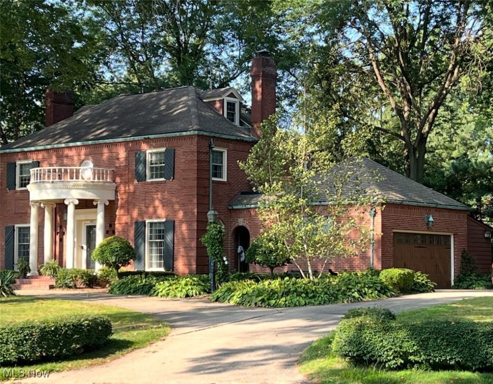 Located in the highly sought after Trumbull County Club area this one of a kind classic Georgian 3 Story all brick home offer timeless design, thoughtful updates and gracious living space throughout. A circular drive and elegant facade with a portico welcomes you to a residence filled with class and character. Step inside the impressive foyer and discover rooms designed for both comfort and entertaining. The updated kitchen features granite countertops, abundant cabinetry, stainless appliances, and an eat-in area with beautiful Hickory floors. A formal dining room showcases stained glass windows and built in corner cabinets for displaying your favorite pieces. The library offers a cozy fireplace and custom built ins while the formal living room boasts another fireplace with detailed dental work that mirrors the home exterior, plus Crown molding for an added touch of sophistication. A convenient 1/2 bath completes the first floor. Upstairs the expansive Master suite includes double closets, private bath and access to a balcony patio with a relaxing Hot Tub. Two additional generously sized bedrooms, a full bath and two hall closets (including a laundry chute) complete the second floor. The 3rd floor provides 2 more bedrooms and an additional bath - ideal for guests or extended family. The finished basement will WOW you with a family room with Ponderosa pine walls, plaster ceilings & fireplace, game room, full bath, laundry room and abundant storage. Outside enjoy a private tree lined backyard, brick and stone patios, and a built-in grill-perfect for summer entertaining. The 2 car garage includes a 20x20 storage room above. This rare brick estate blends elegance, comfort and function! You won't want to miss this one! Central air is one year old and windows come with a lifetime warranty.