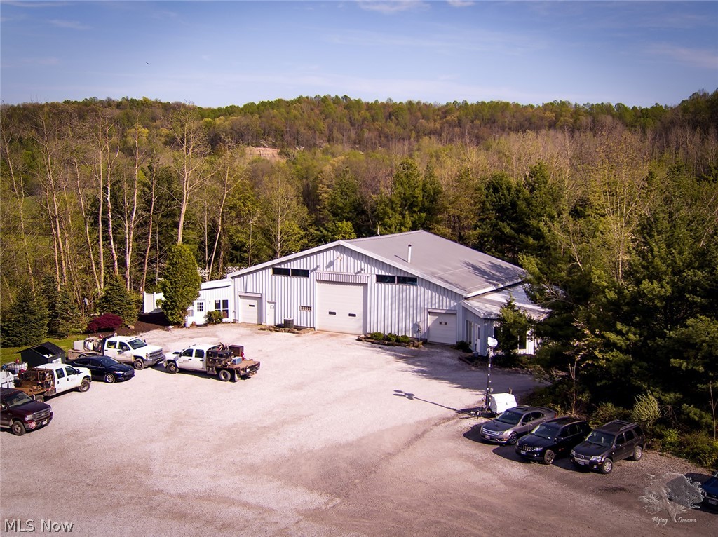 7,500 SF warehouse with office space - Manufactured home - Large aggregate parking lot - Small pond - All situated on 7.91 acres - Current tenant is month to month paying $6,350 plus utilities - Owner is responsible for real estate taxes and insurance - Property has a Net Operating Income of $69,284 with a Cap Rate of 14.50 - Great opportunity - Property is adaptable to many different types of needs - No Zoning - The Company has invested heavily in on-site Oil Tanks, Fuel Tanks, Surface Parking, Office and Warehouse equipment and is likely continue renting for the foreseeable future. Close proximity to the Dover/New Philadelphia market.