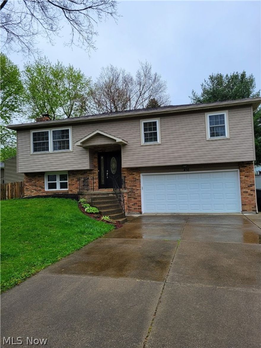 Welcome to this newly updated 3 bedroom 2 full bath bi-level located in the heart of Wadsworth.  Enjoy a new kitchen with an abundance of cabinets, granite countertops, all new SS appliances and a new pantry!!  The main bath has been updated with new flooring, new vanity and toilet.  The home also has newer tilt-in windows, roof and vinyl siding and has been freshly painted.  The lower level family room has new flooring and modern fireplace along with an updated full bath.  And on top of that a brand new furnace was just installed.  The laundry room with lots of storage, rounds out the lower level.  There is a new garage door that helps insulate the HEATED garage!!  Did I mention the new composite deck which includes custom railings and a privacy screen.  The backyard boasts an extra large lot that is fully fenced.  Also in the backyard is huge shed for all your garden equipment.  The home is just minutes from RT.76 and a ton of restaurants and shopping.  This home is truly move in rea