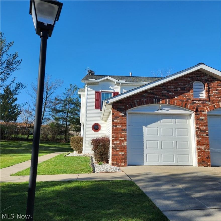 Lovely 2-bedrm townhouse-style condo in the Meadows. Desirable end unit will give the new owners privacy as they enjoy time on the patio and well maintained back & side yard. Kitchen has a breakfast bar & large dining room area. In-suite laundry features a newer washer & dryer. The attached garage has an auxiliary gas heater. The roof was installed less than 10 yrs ago and the front & side windows were installed in 2023. The Meadows is close to shopping, entertainment & highway access. A great place to live and a very reasonable monthly HOA fee that includes lawncare & snow removal. Schedule your tour today.