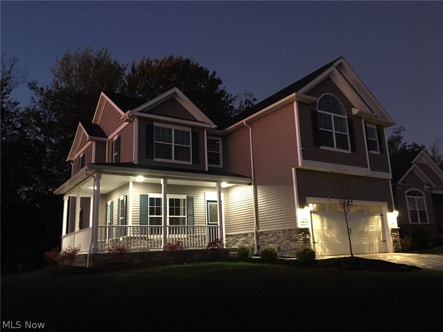 Come and see this Gorgeous new home! What a beautiful place to live in the Hidden Woods Development! Second floor looks over the Chagrin Valley for incredible sunsets!  4 bedrooms upstairs with a cathedral ceiling in the master.  Laundry is also upstairs making for very convenient cleaning!  High efficiency home with a great builders Warranty.  Experienced construction from Weathervane homes! Features include a Wrap around porch and a huge FINISHED basement.  Massive area for the kids to play!  Kitchen appliances included! !0 year basement wall waterproof warranty! Lifetime Window Warranty! Large patio!  Move in Ready!  The landscaping is installed and looks wonderful.  Come and see yourself living here today!