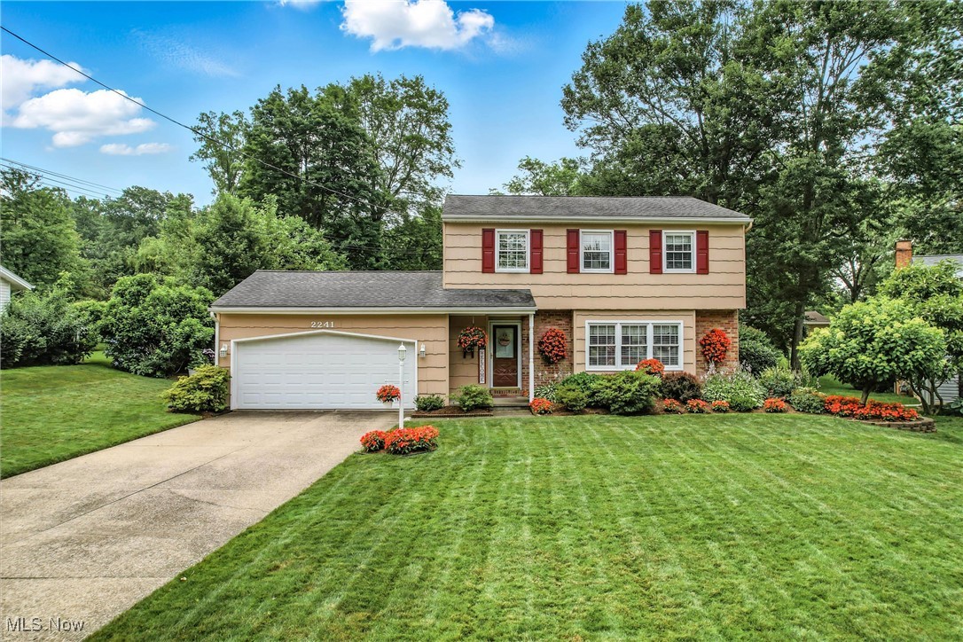 Meticulously Maintained, Move-In Ready Home in Desirable SE Location. This beautifully cared-for two story 4-bedroom home is nestled on a quiet dead-end street in a park-like setting surrounded by lush perennial gardens. Offering pride of ownership throughout, this property is truly move-in ready. Step inside to a thoughtfully updated kitchen (2011) featuring newer cabinets, quartz counters, a tiled backsplash, pantry, and modern appliances—perfect for everyday cooking and entertaining. The main floor also includes a formal living room, formal dining room, and a convenient half bath. Upstairs, you’ll find four spacious bedrooms and a full bath, ideal for families or guests. French doors open to a lovely covered back porch overlooking the private, fenced-in backyard, complete with a shed, mature landscaping, and a relaxing swing — your own private escape that reflects years of dedicated care! The full basement offers a large recreation room, laundry area, and ample storage space. Don’t miss this opportunity to own a home that combines comfort, charm, and location—just minutes from local amenities in a sought-after Southeast neighborhood.