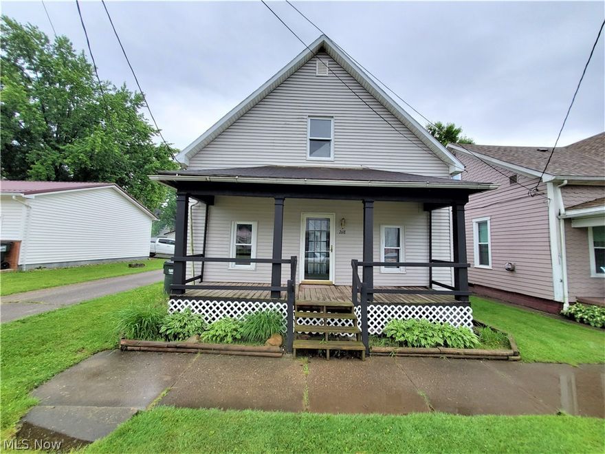 Attention investors or first time home buyers! This property has so much potential. Perfect as a starter home or investment property. Spacious 3 BR home with new flooring on the main floor and freshly painted upstairs. The main floor features one of the bedrooms, a spacious living room, and dining room. The bathroom has w/d hookup and large jetted tub. Upstairs are two additional bedrooms. Enjoy your morning coffee on the large rocking chair ready covered front porch, or relax on the covered back porch, just off the kitchen. This is a great opportunity for first time buyers who love a project to make it their own, or for an investor looking for their next venture. Selling "As Is".