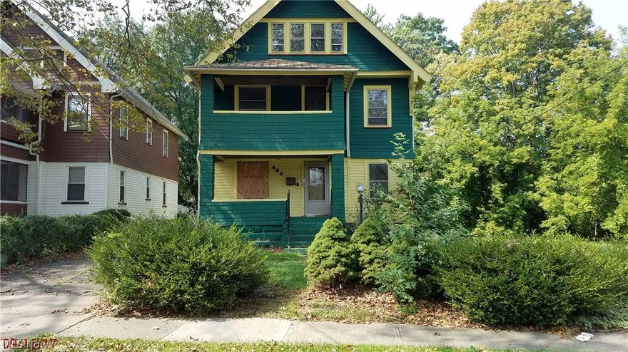 Large two family in improving area. Needs work. Much potential. New owner to assume $4400 in back taxes.