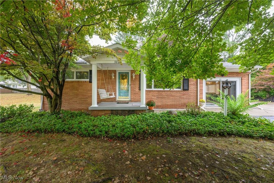 Move in ready 2 bedroom, 2 bath brick ranch with lake view. Amish built oak cabinets in the eat-in kitchen with skylight and pantry. Living room with fireplace, 2 nice sized bedrooms and full bath. Family room off kitchen. Two 3 season sunrooms for your relaxation and enjoyment. Private park like backyard. 2 Car detached garage with new opener (2025) with Wi-Fi capabilities. Full basement with partially finished rec room with fireplace and full bath. Close to all Portage Lakes activities. Lake views!