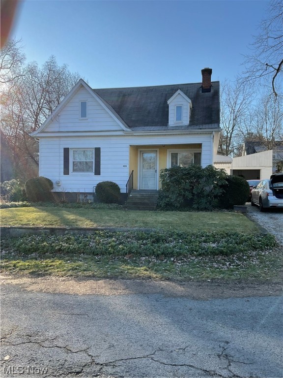 Much larger than it appears! 4 bedrooms, sitting room, large eat in kitchen with appliances. 3 full baths, 2 finished rooms in the basement, great back yard with patio.