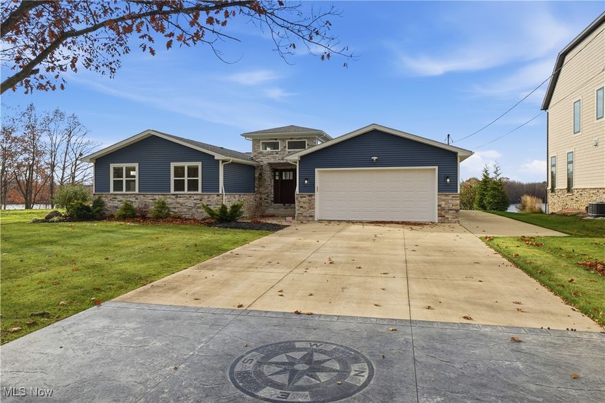 Welcome to this phenomenal, completely remodeled lakefront ranch—where luxury, comfort, and breathtaking views come together in one stunning package.

Step inside the impressive open foyer and into a bright, open-concept living space designed to maximize the panoramic views of the main lake. The gorgeous kitchen features quartz countertops, a large island, and a spacious dining area that flows seamlessly into the living room—perfect for entertaining or relaxing while overlooking the water.

Sliding doors lead to an expansive three-tiered deck with stairs down to the seawall and private dock, complete with a pontoon lift, speed boat lift, and jet docks. Located on one of the widest and most desirable parts of the lake, this home offers unforgettable sunsets year-round.

The split floor plan includes a luxurious master suite with lake views, double sinks, and a beautifully tiled walk-in shower. On the opposite side of the home, you'll find three additional large bedrooms, a full bath, and a convenient laundry room.

An open staircase leads to the finished basement, featuring a spacious family room, pool table area, and another full bath—ideal for guests or game nights. A two-car attached garage completes the package.

Everything in this home is brand new—simply move in and start enjoying lakefront living at its finest.